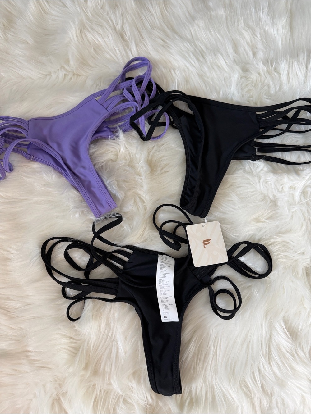 3 pairs of Fabletics Noa Strappy Swim Thong Bottoms
